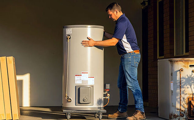Plumber Replacing Tank